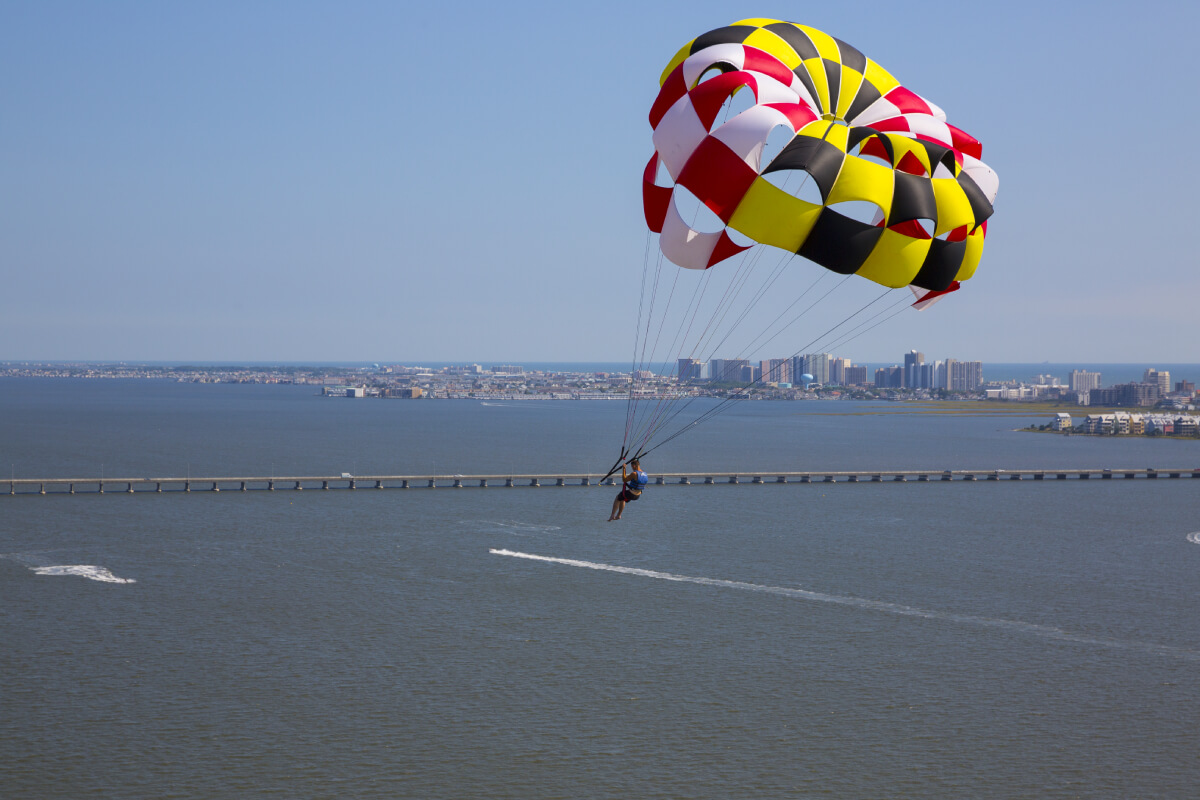 Man parasailing over the bay.